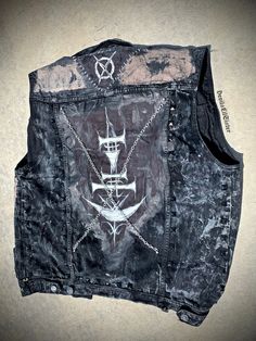 Punk Sleeveless Denim Vest For Streetwear, Rocker Style Fitted Vest For Streetwear, Punk Distressed Denim Vest For Streetwear, Edgy Sleeveless Vest For Biker Events, Distressed Punk Denim Vest For Streetwear, Gothic Fitted Vest For Streetwear, Fitted Grunge Vest For Festivals, Edgy Fitted Denim Vest For Streetwear, Distressed Grunge Denim Vest For Streetwear