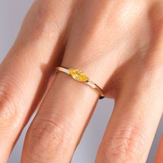 Here is Marquise Citrine Ring 14K Gold for Women! This November Birthstone Ring will be perfect matches as a other yellowing ring 18K. With 10K 18K Gold Customize Yellow Gemstone Ring is best balance of minimalism.  This November Birthstone Ring will be great marquise citrine ring or marquise birth stone ring in her daily life as well! This citrin ring 14K gold can be switch with her birthstone or birth month stone as well and can be customize rings 10K. This Sturdy and Stunning custom gemstone ring or yellow lover gift ring lover symbolizing your everlasting love & serves as a perfect gifted her as a for daughter, women, wife, girlfriend or best friend! Please check our other birthstone gold rings: https://www.etsy.com/shop/Cristojuanna?ref=seller-platform-mcnav§ion_id=43057914 Ring Featu Citrine Marquise Ring, Birth Month Stone, Birth Month Stones, Custom Gemstone Rings, Yellow Gemstone Ring, Printable Ring Sizer, November Birthstone Ring, Yellow Rings, Yellow Gemstones