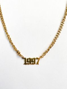 1997 birth year necklace 18K gold plated 18 inch chain length with extender Dainty link chain and 1997 pendant Perfect for layering or to wear alone Care: Avoid contact with water, lotions, perfumes etc.  Wipe down jewelry after use to preserve shine Birth Date Necklace, Vintage Gold Necklace For Birthday, 1997 Necklace, 1998 Necklace, Birth Year Necklace, Year Necklace, Date Necklace, Number Necklace, Dope Jewelry