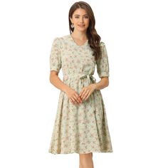 Designed as a lightweight midi option, this cute regular-fit floral dress has a flattering empire line silhouette. Lightweight and flowing, the flared silhouette is decorated in neutral flowers and is trimmed with pretty lace detailing. Pair it with strappy sandals or elegant high heels and add a clutch for a wedding guest look. Occasion: Vacation, Weekend, Gathering, Casual, Beach, Date, Wedding. Knee-length Ditsy Floral Midi Dress For Garden Party, Feminine Floral Print Knee-length Midi Dress, Feminine Ditsy Floral Knee-length Dress, Knee-length Ditsy Floral Print Dress For Daywear, Flowy Knee-length Midi Dress With Ditsy Floral Print, Flowy Floral Print Knee-length Midi Dress, Modest A-line Dress With Floral Print, Spring Floral Knee-length Dress For Daywear, Knee-length Floral Dress For Spring Daywear