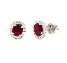 Indulge in luxurious elegance with our 1.13carat ruby and diamond halo stud earrings. Embrace the stunning contrast of the vibrant ruby and dazzling diamonds in a classic halo design. Elevate any outfit with this exquisite touch of sophistication and make a statement that will leave a lasting impression. Metal: 18K White GoldDiamond Weight (32): 0.16ct twRuby Weight (2): 0.97ct twBacking: Push Backs Dimensions: L 8mm X 7mm Halo Stud Earrings, Halo Design, Halo Earrings Studs, Ruby Earrings, Diamond Halo, Rose Gold Earrings, Halo Diamond, Halo, Ruby