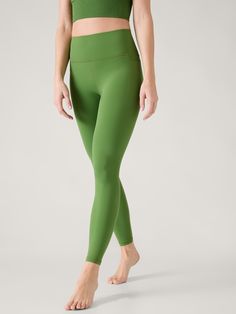 Transcend Stash High Rise Legging | Athleta Green Stretch Seamless Leggings, Green High-waist Stretch Leggings, Green Compressive Versatile Leggings, Green Stretch Full-length Leggings, Green 4-way Stretch Running Leggings, Tennis Skort, Bra Dress, Flowy Shorts, High Rise Leggings