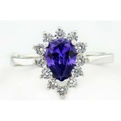 Carat: Solid .925 Sterling Silver Plated Shape: Pear & Round Net Weight: 2.38 Grams Gem Type: 1 Created Amethyst - 5.25 Carats Amethyst Grades, Hue . . . Purple Tone . . . Medium Saturation . . . Vivid No Inclusions Or Flaws 12 Created White Sapphire Total Weight: 0.36 Carats White Sapphire Grades, Hue . . . White Saturation . . . Vivid No Inclusions Or Flaws Finger Size: 8.25 Dimensions: 7 Mm X 8 Mm - Main Gemstone Measurements Purple Tone, White Sapphire Ring, White Sapphire, Jewelry Gift Box, Womens Jewelry Rings, Sapphire Ring, Beautiful Jewelry, Silver Plate, 925 Silver