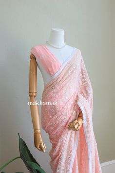 Beautiful Soft Chikaankari Saree in georgette fabric. It's very soft and sits very well on your body. It includes unstitched georgette peach plain blouse. Suitable in any asian occasions. Please message for more informations. Pink Georgette Blouse With Sheer Dupatta, Unstitched Orange Georgette Blouse Piece, Pink Georgette Blouse With Dupatta, Semi-stitched Blouse Piece With Pallu In Peach, Peach Blouse Piece With Cutdana Traditional Drape, Peach Blouse Piece With Resham Embroidery For Saree, Peach Saree Blouse Piece With Zari Work, Peach Saree Blouse Piece With Resham Embroidery, Traditional Peach Blouse Piece With Traditional Drape