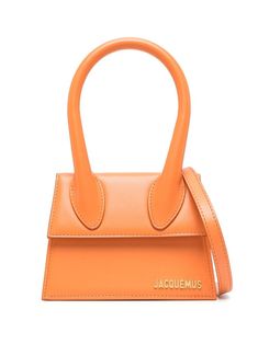 Le Chiquito mini bag from Jacquemus featuring orange, calf leather, gold-tone logo plaque, foldover top with magnetic fastening and adjustable shoulder strap. Le Chiquito Moyen, Jacquemus Le Chiquito, Jacquemus Bag, Fancy Bags, Mini Tote Bag, Orange Bag, Orange Leather, Mini Handbags, Mini Tote