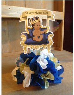 a birthday card with a teddy bear sitting in a chair on top of blue and yellow flowers