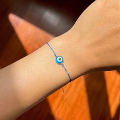 ❪ ABOUT BRACELET ❫ Light Blue Evil Eye represents general protection, solitude and peace. ⎯ ❪ STEPS TO ORDER ❫ STEP 1: In the 1st drop-down, choose the "Thread Colour". * 20 colours available for thread STEP 2: In the 2nd drop-down, choose the "Beads Material" for 2mm beads beside Evil eye and the 4mm rubber bead. STEP 3: In the "Quantity", choose the quantity of the bracelet. STEP 4: Click "Add to basket" to checkout, or repeat step1-4 to add another bracelet. ⎯ ❪ SIZE GUIDE ❫ The bracelet has Adjustable Blue Symbolic Bracelet, Blue Round Spiritual Charm Bracelet, Blue Adjustable Evil Eye Bracelet, Adjustable Blue Evil Eye Bracelet, Spiritual Adjustable Chain Bracelet Gift, Adjustable Blue Evil Eye Bracelet For Spiritual Purposes, Adjustable Blue Spiritual Evil Eye Bracelet, Blue Hypoallergenic Spiritual Bracelets, Blue Adjustable Evil Eye Bracelet For Friendship