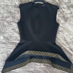 Louis Vuitton Jersey Sleeveless Top. Never Worn, Perfect Condition. Has Lv Monogram Trim Along The Bottom And A Zipper On A Back. Comes With Original Hanger. Size Fr 36 Or Us 4 Designer Sleeveless Tops For Evening, Designer Sleeveless Party Tops, Luxury Sleeveless Tops For Evening, Designer Black Sleeveless Top, Louis Vuitton Top, Chevron Blouse, White Top Women, Beaded Blouse, Blouse Short Sleeve