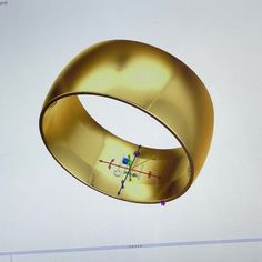 an image of a gold ring on a computer screen