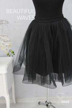 "Floor length skirt with horsehair edge \"Swan\" - https://www.etsy.com/listing/554785692/new-horsehair-black-wave-tulle-skirt?ref=listings_manager_grid TRINITY Horsehair Edge Tulle Skirt Amazing tulle skirt is made of 4 layers of softest air wedding luxury tulle. It is framed by a rigid edge for the formation of beautiful waves on the top layer. Belt inside pasted with dublirin lining material for additional stiffness and the beauty of the belt. Thick satin/silk lining chic quality and a belt w Black Ruffled Tulle Petticoat, Black Tulle Tiered Skirt, Black Summer Tulle Petticoat, Summer Black Tulle Petticoat, Black Tulle Petticoat For Summer, Black Tiered Skirt Petticoat For Party, Party Full Skirt Tulle Petticoat, Black Tulle Full Skirt Petticoat, Black Tiered Petticoat For Party