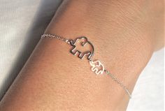 "Cute Elephants Sterling Silver Dainty Bracelet Bracelet has to ring length at 6.2\" and 7\" / 16cm and 18cm  Charm size: 21x11mm   Sterling Silver 925 weight: 1.30g Please note this bracelet very dainty! Pretty gift wrap included with the bracelet, ready to give as a gift. Thanks for Looking!" Cute Elephants, Elephant Charm Bracelet, Animal Bracelet, Tiny Elephant, Elephant Jewelry, Punk Earrings, Memorial Bracelet, Elephant Bracelet, Mother Jewelry