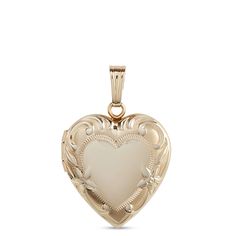 Our 14K yellow gold locket is tailor-made for the little treasures you always want close to the heart. This heart-shaped, hand engraved locket is meticulously crafted for a lifetime of wearing and honors a timeless tradition in fine jewelry making. It’s the perfect gift for yourself or someone you love. Yellow Gold Open Heart Locket Necklace Keepsake, Engraved 14k Gold Double Heart Jewelry, 14k Gold Engraved Double Heart Jewelry, Keepsake Yellow Gold Locket Necklace With Heart Charm, Elegant Heart-shaped Engraved Locket Necklace, 14k Gold Heart Cut Locket Jewelry, Elegant Double Heart Engraved Locket Necklace, Elegant Engraved Double Heart Locket Necklace, Elegant Engraved Open Heart Locket Necklace