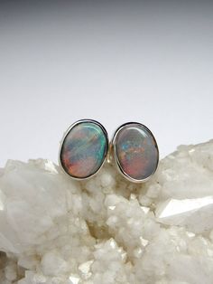 Sterling silver stud earrings with natural Black Opal opal origin - Australia weight of the earrings - 1.4 grams stone measurements: 0.24 x 0.31 in / 6 х 8 mm ref No 2461 Worldwide shipping from Berlin, Germany. Prices include all taxes, valid in Germany and in European Union countries on the Customer's order date. Price does not include import taxes and custom duties. It is the Customer's full liability to pay any possible customs duties, import taxes or other applicable and due by the concerne Oval Opal Jewelry With Matching Earrings, Silver Opal Earrings For Anniversary, Anniversary Silver Opal Earrings, Opal Gemstone Earrings For Anniversary, Opal Cabochon Jewelry Gift, Opal Cabochon Jewelry For Gift, Handmade Opal Earrings In Silver, Formal Oval Opal Earrings, Oval Opal Earrings For Formal Occasions