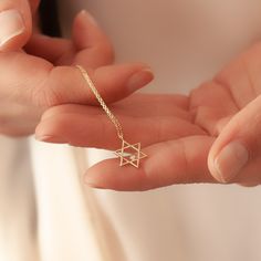 "Star of David pendant necklace in 14k or 18k SOLID Gold, Dainty Magen David Diamond Pendant, Jewish Star Necklace Gold Religious Gift For Her For Him Material: Solid Gold (real gold, not gold plated or gold filled material) Available Gold Karat: 14K (585), and 18K (750)  Pendant Width:  1.20 cm Pendant Height:  1.50 cm Available Gold Colors: Yellow gold, rose gold and white gold (optional) Available chain thickness: 0.84mm (type #2), 0.95mm (type #3) Diamond weight: 0.01 ct  Diamond color: G-H Yellow Gold Star Of David Charm Necklace Gift, Yellow Gold Star Of David Charm Necklace, Star Of David Tarnish Resistant Necklace Gift, 14k Gold Star Of David Necklace Gift, 14k Gold Star Of David Necklace For Anniversary, Gift 14k Gold Star Of David Necklace, 14k Gold Star Of David Jewelry Gift, Gold Star Of David Necklace With Birthstone, Symbolic Star Of David Necklace For Gift