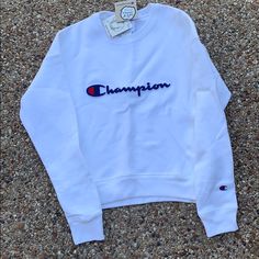 White Jacket With Champion Logo In The Middle White Crew Neck Outerwear For Spring, Fall White Outerwear With Embroidered Logo, Trendy White Outerwear With Ribbed Cuffs, White Streetwear Outerwear With Embroidered Logo, Crewneck Men, Champion Jacket, Champion Crewneck, Champion Logo, Champion Reverse Weave