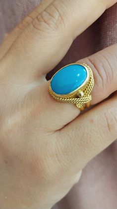 This item is Handmade 18K Gold Women Ring With Turquoise Stone  , Gold Oval Design Handcraft Ring , Gold Women Jewellery , Gift For Her , Gift Ideas ITEM DETAILS  Weight and Size : This product is 7,80 grams. Orijin : Made in Turkey Gender : Female  Material: 18K Gold -Turquoise Stone  PACKAGING: Your product  will be packed in a special  box, carefully. CUSTOMER SERVICE If you have any questions, please do not hesitate to be in contact  with me , I will be too happy to answer your all questions. ✔ Ready to Ship in 1-3 Business Days ✔ Shipping  3-5 business days with free shipping. https://www.etsy.com/your/shops/NoraFineJewelry/tools/listings/1569224059 Luxury Oval Turquoise Ring, Gold Oval Hallmarked Turquoise Ring, Oval Turquoise Cabochon Ring In Yellow Gold, Luxury Turquoise Cabochon Ring In Yellow Gold, Oval Yellow Gold Turquoise Ring With Cabochon, Luxury Yellow Gold Turquoise Cabochon Ring, Luxury Turquoise Oval Cabochon Ring, Luxury Oval Turquoise Gemstone Ring, Elegant Gold Turquoise Cabochon Ring