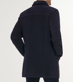 Car coat crafted in 60% wool, 30% polyester, and 5% viscose.Exposed button closure.Faux leather trim.Welt pockets.Fully lined.Imported Winter Outerwear With Stand Collar And Welt Pockets, Winter Outerwear With Welt Pockets And Stand Collar, Classic Blue Outerwear With Stand Collar, Blue Winter Outerwear With Hidden Button Closure, Blue Outerwear With Hidden Button Closure For Winter, Classic Navy Outerwear With Concealed Placket, Wool Outerwear With Stand Collar And Buttons, Winter Business Casual Pea Coat With Concealed Placket, Winter Outerwear Single Breasted With Fold Down Collar