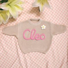 Our personalized sweaters are perfect for various occasions. These customizable sweaters are very beautiful and can be shared with baby in your life, including baby welcome parties, holiday gifts, birthdays, charming photo shoots, and capturing those precious milestone moments. They can also be used for pregnancy and childbirth announcements, as well as making a great baby shower or birthday gift! And they are also a heartfelt way to express' Congratulations! 'to add extra warmth to new or expectant mothers. All sweater are hand embroidered, and the font and design of each sweater are unique. Each name is hand embroidered with high-quality wool yarn. Warm and comfortable: Made of soft fabric to ensure that babies stay warm during cold seasons. High quality materials: We insist on using hig Personalized Pink Long Sleeve Sweater, Personalized Pink Crew Neck Sweater, Personalized Pink Sweater For Winter, Customizable Cute Winter Sweater, Cute Customizable Winter Sweater, Cute Crew Neck Birthday Sweater, Cute Sweater For Birthday In Winter, Cute Winter Sweater With Letter Embroidery, Cute Crew Neck Sweater For Birthday