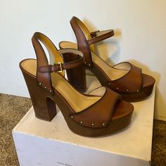 Michael Kors Platform High Heel Sandals. In Brand New Condition Only Worn Twice. Women’s Size 8.5. Brown Sandals With 4-inch Heel For Beach, Brown Block Heel Wedge Sandals For Party, Brown 4-inch Heel Sandals For Beach, Brown High Heel Sandals With 4-inch Heel, Brown Wedge Heel Sandals With Padded Heel, Brown High Heel Sandals Medium Width, Brown Sandals With 4-inch Open Heel, Brown Heel Strap Wedge Sandals For Party, Brown Wedge Sandals With Heel Strap For Party