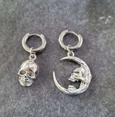 316L Surgical Steel, Hypoallergenic **Choose single earrings or pairs...mix and match options** Great for guys or girls!  Mix and match. Charms are removeable. Sword measures about 3" long. Lightweight and comfortable. Fit normal pierced ears. Click below to see more goth earrings: www.etsy.com/shop/TikiTorchDesigns?ref=seller-platform-mcnav&search_query=goth+earrings **Great gift for yourself or a friend!  Choose the gift message option when you check out if you want me to include a FREE gift b Punk Style Metal Dangle Hoop Earrings, Emo Style Pierced Metal Earrings, Silver Metal Emo Earrings, Silver Metal Emo Style Earrings, Alternative Metal Pierced Earrings, Gothic Jewelry For Halloween, Gothic Streetwear Jewelry For Halloween, Gothic Dangle Hoop Earrings, Punk Style Metal Cartilage Earrings