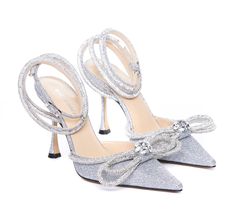 Mach & Mach silver pumps sandals, all over strass detail, fabric upper, bow detail, snkle strap with buckle closure, eu size Composition: 100% Fabric/ Leather Sole | Mach & Mach Women's Pumps Sandals in Silver | SS24 High Heels For Women, Kurt Geiger Heels, Margiela Shoes, Silver Pumps, Double Bow, Heels For Women, Sneaker Wedge, Crystal Embellishment, Pendant Rings