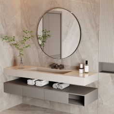 a bathroom with a sink, mirror and towel rack on the wall next to it