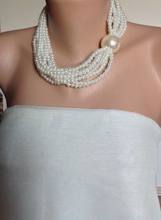 I designed this very romantic necklace with big size imitation pearl and small ivory pearls It is boho chic design and also vintage inspired work For something unique to yourself, mix and match the piece with other items in your jewelry collection. It is beautiful,stylish,elegant wedding accessory! You can wear it for your special evenings,night out,graduations,birthdays.... Cream Pearl Necklace With Pendant For Wedding, Cream Pearl Pendant Necklace For Wedding, Cream Pearl Drop Necklace For Wedding, Cream Pearl Pendant Necklace, Cream Pearl Necklace With Pearl Charm, Elegant White Bridal Necklace For Bridal Shower, Pearl White Beaded Necklaces With Pearl Drop For Wedding, Elegant Cream Beaded Necklaces With Pearl Drop, Pearl White Beaded Necklace With Pearl Chain For Wedding