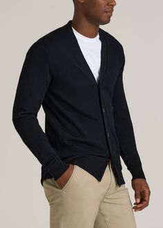 Get Wrapped Up in Warmth So Soft, So Stylish Experience the luxury of our Merino Wool Cardigan Sweater for Tall Men. This stylish tall men's sweater is perfect for layering over dress shirts or tees, offering both warmth and sophistication. Its ribbed cuffs and hem ensure a snug fit, while the modern fit keeps you looking sharp.• Tall men's merino wool sweater for superior warmth and softness• Ribbed cuffs and hem for a secure, stylish fit• Long sleeves and modern fit perfect for tall men SIZE & Scrubs Dress, Cool Looks, Cozy Sleepwear, Over Dress, Tall Men, Men In Black, Merino Wool Cardigan, Sports Blazer, Long Sleeve Tee Shirts