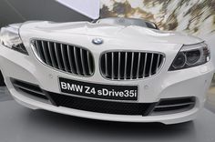 the front end of a white bmw z4