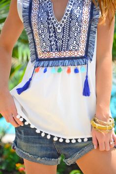 This summery top is all fun with embroidery, fringe aaaand pom pom trim! It's a total statement top that we can't wait to rock all summer long. Fabric is a lightweight 100% cotton. Pompom Outfit, Pom Pom Fashion, Diy Dresses, Fun Embroidery, Pretty Clothing, Sassy Style, Boho Jacket, Casual Tunics, Latest Tops