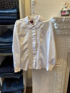 peter pan collar blouse Tagged Size: L Pit to Pit: 20" Length: 26" Arm: 22" Price: $27 SHIP TO CANADA & USA ONLY  ALL SALES FINAL  IG: @ judyjeanvintage  27 William St. Paris ON.  #vintage #cottagecore #poet #dresshirt #white Elegant Fall Blouse With Striped Collar, Classic Collared Blouse With Placket, Fall Button-up Blouse With Striped Collar, Button-up Blouse With Striped Collar For Fall, Fall Collared Blouse With Placket, Fall Blouse With Collar And Placket, Classic Peter Pan Collar Top For Fall, Classic Cotton Top With Ruffled Collar, Fall Daywear Shirt With Striped Collar