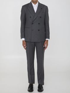 This two-piece suit is made from a luxurious blend of wool and cashmere, featuring a double-breasted jacket with peaked lapels, a brooch on the lapel, front button closure, and multiple pockets including a chest pocket and buttoned cuffs. The straight-leg trousers have convenient zip, button, and hook-and-eye closure, as well as side and rear pockets. Regular fit.   Size nationality: IT  Double breasted  Peaked lapels  Brooch  Button closure  Pockets  Straight leg pants  Side and rear pockets  Product code: IV5905EIVSF63409920  Composition: 89% wool, 10% cashmere, 1% elastane Tailored Double-breasted Tuxedo For Formal Events, Elegant Business Casual Set With Double Button Closure, Elegant Sets With Double Button Closure For Business Casual, Tuxedo Style Semi-formal Pantsuit With Double Button Closure, Semi-formal Tuxedo Style Pantsuit With Double Button, Elegant Tailored Double-breasted Sets, Workwear Three-piece Suit With Notch Lapel And Buttons, Notch Lapel Three-piece Suit For Work, Notch Lapel Three-piece Suit With Buttons For Work