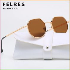 Metal Polygon Sunglasses Men Women Minimalist Party Classic Shade Glasses UV400 Description Brand：FELRES Frame Material : Metal Lens material：Plastic Anti-UV rating: UV400 Whether polarized : No. Gender ：Women   Lens Width：about 52 mm Lens height：about 46 mm   Bridge：about  20 mm Frame Width: about 137 mm Temple Length : about 148 mm Package included： 1*Sunglasses（Not include boxes and other accessories） Note: 1. Due to the different monitor and light effect, the actual color of the item might be slightly different from the color showed on the pictures. Thank you! 2. Please allow 1-3mm measuring deviation due to manual measurement. Brand FELRES Country/Region of Manufacture China MPN Does Not Apply Type Sunglasses Department Men Model 19620 Frame Material Metal Style Polygon Theme Classic, Octagon Sunglasses, Sunglasses Men Vintage, Vintage Lenses, Luxury Branding Design, Vintage Frame, Trending Sunglasses, Metal Sunglasses, Men Vintage, Sunglass Lenses