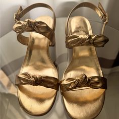 Gold J.Crew Sandals Size 7. Name Is Faux Leather Double Bow Heel Sandals. Brand New As I Used Black For Wedding In May. Beautiful And Comfortable. Gold Low Heel Sandals For Spring, Gold Low Heel Beach Heels, Gold Low Heel Synthetic Sandals, Gold Synthetic Sandals With Heel Strap, Chic Gold Synthetic Sandals, Chic Gold Wedge Sandals With Buckle Closure, Wedding In May, Moccasins Women, Double Bow