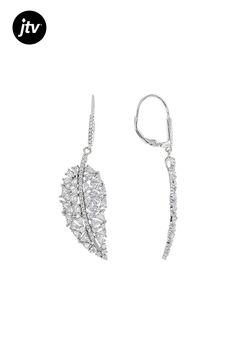 Bella Luce �� white diamond simulant 14.01ctw round, triangle, and pear, rhodium over sterling silver earrings. Measure approximately 2.06"L x 0.56"W and have leverback closures. The diamond equivalent weight is 8.57ctw. Modern Pear-shaped Cubic Zirconia Jewelry, Hypoallergenic Diamond Jewelry For Formal Occasions, Formal Hypoallergenic Diamond White Jewelry, Formal Pierced Cubic Zirconia Jewelry, Silver Diamond Cut Pear-shaped Earrings, Silver Hypoallergenic Pear-shaped Jewelry, Hypoallergenic Pear-shaped Silver Jewelry, Diamond Simulant, White Diamond