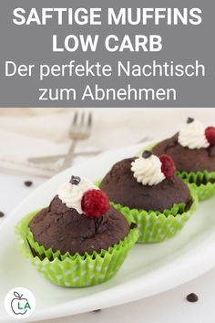 two chocolate cupcakes with whipped cream and raspberries on top