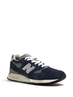 New Balance Textured Sole Lace-up Sneakers, Navy Low-top Sneakers With Textured Sole, Leather Running Shoes With Logo Patch For Streetwear, Classic Blue Sneakers With Textured Sole, Classic Navy Sneakers With Textured Sole, Classic Navy Sneakers With Contrast Sole, Casual Leather Running Shoes With Logo Patch, Running Shoes With Logo Patch Suitable For Jogging, High-top Leather Running Shoes With Logo Patch