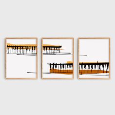 three framed art prints with different shapes and sizes