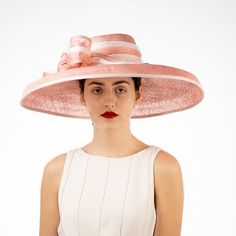 Sinamay hat in pale pink and ivory. Perfect for the Kentucky Derby and weddings. Also available in tan. This hat is more pink in person. Much like the photos with the model. Elegant Fitted Pink Cloche Hat, Kentucky Derby Hats With Structured Crown, Chic Pink Wide Brim Straw Hat, Elegant Pink Hat, Pink Sun Hat For Spring Weddings, Pink Sun Hat For Summer Wedding, Elegant Pink Hat With Short Brim, Chic Pink Short Brim Straw Hat, Elegant Pink Straw Hat For Summer