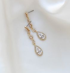 Our Bijou Bridal teardrop earrings are long, sleek and set in rose gold finish with Premium cubic zirconia stones - Premium cubic zirconia stones - All clear stones - Rose gold, yellow gold or rhodium (white gold)- Earrings measure 1-7/8 inches x 3/8 inch- Nickel free and hypoallergenicThis is an original design by © Treasures by Agnes Teardrop Bridal Earrings, White Gold Earrings, Clear Stone, Cz Stone, Bridal Earrings, Gold Yellow, Teardrop Earrings, Gold Finish, Original Design