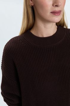 Mockneck long sleeve sweater with wide ribbed cuffs and collar. Crafted from a marled, waffle knit with directional knitting and dropped shoulders for a relaxed fit and transitional wearability. Espresso is a deep brown color offering that's exclusively ours. 100% Cotton Imported Knit Sweater With Ribbed High Neckline, High Neck Knit Sweater With Ribbed Neckline, Casual Knit Turtleneck With Ribbed Neckline, Oversized Knit Cropped Sweater With Ribbed Neckline, Modern Sweater With Funnel Neck, Textured Knit Funnel Neck Sweater For Work, Workwear Textured Knit Sweater With Funnel Neck, Cozy Sweater With Ribbed Neckline For Work, Workwear Funnel Neck Sweater With Ribbed Neckline