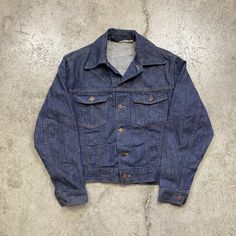 good vintage condition. stain on back. no holes or tears. fits short.  please refer to approximate measurements (flat) below - may not fit as tagged pit to pit - 21" collar to hem - 22.5" if you have any questions, please ask. Vintage Selvedge Denim Jacket For Fall, Vintage Dark Wash Selvedge Denim Jacket, Vintage Cotton Denim Jacket, Pre-washed, Vintage Fitted Selvedge Denim Jacket, Fitted Vintage Denim Jacket, Vintage Selvedge Denim Jacket, Vintage Dark Wash Denim Jacket, Denim Trucker Jacket, Selvedge Denim