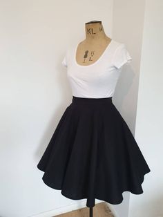 My best selling black skater skirt now with a full lining! The same gorgeous skirt you all know and love, with the same deep pockets! But now with a solid black lining  Outer skirt 100% cotton, lining 100% polyester A staple and versatile item in my own wardrobe, great for all occasions. This lightweight skirt can be dressed up with a top and belt, or worn with a jumper for a more casual look Available in 3 lengths, from mini, midi and tea length  Choose your waist, and length from the drop down, if you'd like a length not listed drop me a message and I'll be happy to help Invisible zip in the center back, seamlessly closes the skirt whilst the hook & eye, gives a secure finish to the top of the waistband Photographed both with and without a tulle petticoat to show its fullest potential, b Capsule Wardrobe Plus Size, Skirt Capsule Wardrobe, Women Capsule Wardrobe, Wardrobe Plus Size, Plus Size Grunge, Skater Skirt Outfit, Dark Academia Clothing, High Waisted Skirts, Lightweight Skirt