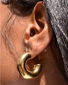 Minimal enough to be an everyday signature, our Ebony earrings have a chunky shape that wraps around your lobes. They’re sweatproof, making them safe to wear from workouts to wherever. 18k gold plated stainless steel or stainless steel Waterproof & tarnish resistant Diameter: 30mm, Thickness: 10mm Chunky Gold Hoop Earrings, Gold Rings Stackable, Mixed Metal Jewelry, Cuff Bangle Bracelet, Waterproof Jewelry, Charm Rings, Chain Anklet, Anklet Bracelet, Everyday Earrings