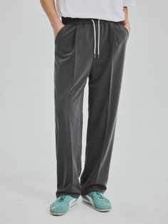 This is a comfortable pants that is made out of high quality polyester, rayon, and spandex blend fabric. With minimal design detail of semi wide silhouette, elastic waistband, and tentar and tumble wahsed fabric, it gives a comfortable and trendy mood. - Semi wide silhouette- Elastic waistband with string- Tentar and tumble washed fabric Versatile Relaxed Fit Dress Pants With Elastic Waistband, Relaxed Fit Wide-leg Dress Pants With Elastic Waistband, Casual Wide Leg Pants With Comfort Stretch, Casual Tapered Leg Pull-on Dress Pants, Casual Straight Leg Dress Pants With Pull-on Style, Casual Pull-on Straight Leg Dress Pants, Casual Stretch Dress Pants With Elastic Waistband, Gray Wide Leg Trousers With Elastic Waistband, Casual Dress Pants With Elastic Waistband And Tapered Leg