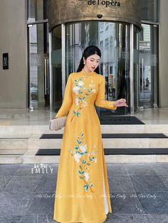 🌻 Stretchy level: 2/10 🌻Material: Lụa vân gỗ 🌻 The measurement of this ao dai (long dress) is in Vietnamese size (American size tends to be bigger for the same size). Please LOOK AT THE SIZE CHART CAREFULLY BEFORE ORDERING. There might have some chalk writings on the fabric due to making process. These marks can be washed away easily. 🌻No returns or exchanges Buyer can contact seller about any issues with an order. 🌸 Follow us Facebook/aodaiemily www.aodaiemily.com 💜 Thank you very much!💜 Spring Bridesmaid Gown With Floral Embroidery, Spring Banquet Gown With Floral Applique, Spring Floral Applique Bridesmaid Gown, Elegant Spring Ceremony Gown, Spring Bridesmaid Gown With Floral Applique, Elegant Ao Dai With Floral Embroidery For Spring, Floral Print Embroidered Maxi Dress For Wedding, Long Sleeve Embroidered Gown For Spring, Spring Ceremony Dress With Floral Embroidery