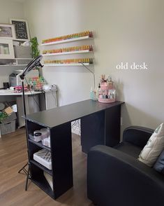 a room with two black chairs and a desk