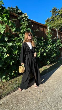 "Black Oversized Kimono, Hand black kimono robe, Long unisex robe, Black Kimono, boho robe, Beach Coverup, gift for her Name: Black Swan kimono robe  - Beautiful handcrafted kimono robe - Sizes: One size -Oversize all fit 👈🏽 - Chest & Hip: 60 inches. Length: 55inches. 👈🏽 - Removable waist tie closure/belt - Side slits at hem - two POCKETS😊 - 100% Soft Rayon, lightweight - Hand wash in cold water, hang dry. - You can wear it at the beach, or even from day till night on your holidays! It's also suitable for relaxing moments at home - At first, you may feel the material is not so soft as described or may have some strange smell because of the process. But the difference will be visible after the first wash. You will get soft and super comfy ready-to-go wear. -Ethically made 🙌🏽 fairly t Oversized Black Long Sleeve Abaya, Oversized Long Sleeve Black Abaya, Oversized Black Abaya, Black Oversized Long Abaya, Oversized Black Long Abaya, Long Black Abaya For Spring, Long Black Spring Abaya, Black Long Abaya For Spring, Spring Black Long Abaya