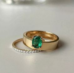 Natural Emerald Ring in 18k Gold | with Matching Diamond Band | Statement Ring | Engravable Ring | 18K Gold Jewelry | This is NOT a Set Your Favorite Daily Dose Of Jewelry .Beautiful 18K yellow gold ring with one round cut emerald at the face of the ring. Perfect high end fashion ring for everyday use. Would also perfectly match big occasions. Specification Metal: 18K yellow gold Emerald Ring Weight: 3.5g appro. (varies by size) Diamond Band Weight: 1.2g appro. (varies by size) Main Stone: Emera Classic Yellow Gold Emerald Wedding Jewelry, Elegant 14k Gold Gia Certified Emerald Ring, Timeless Green Round Band Jewelry, Exquisite Green Emerald Ring In 14k Gold, Exquisite 14k Gold Green Emerald Ring, Luxury Yellow Gold Emerald Solitaire Ring, Luxury Solitaire Emerald Ring In Yellow Gold, Heirloom Emerald Cut Green Wedding Ring, Timeless Green Emerald Ring In 14k Gold