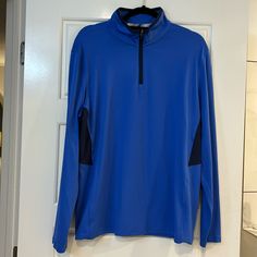 Puma Golf Royal Blue And Black 3/4 Zip Pullover. Lightweight! Never Worn! Excellent Condition!! Navy Sporty Half-zip Top, Sporty Navy Half-zip Top, Athleisure Long Sleeve Tops For Golf, Blue Long Sleeve Sportswear Top, Blue Stretch Half-zip Top, Blue Crew Neck Top For Golf, Blue Crew Neck Outdoor Activewear, Functional Blue Long Sleeve Tops, Blue Sportswear Tops For Outdoor